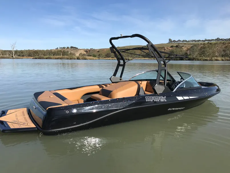 Super Sport in black and tan on the river